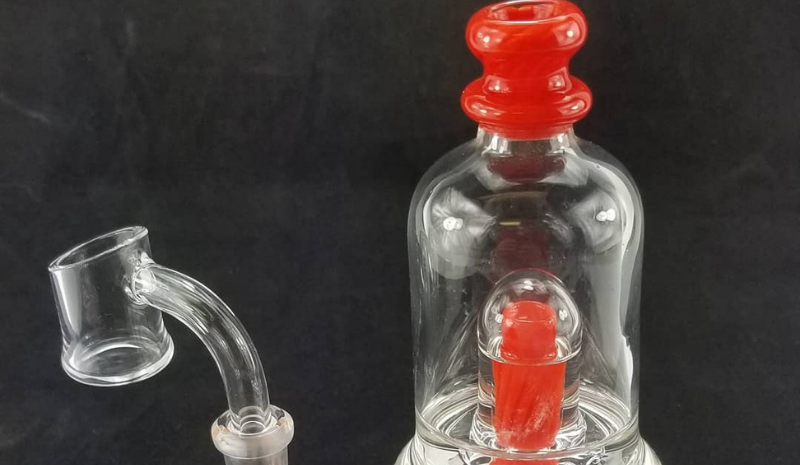 Glass dab rig with red carp cab